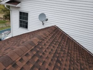 New Jersey roofer doing roof maintenance to a home